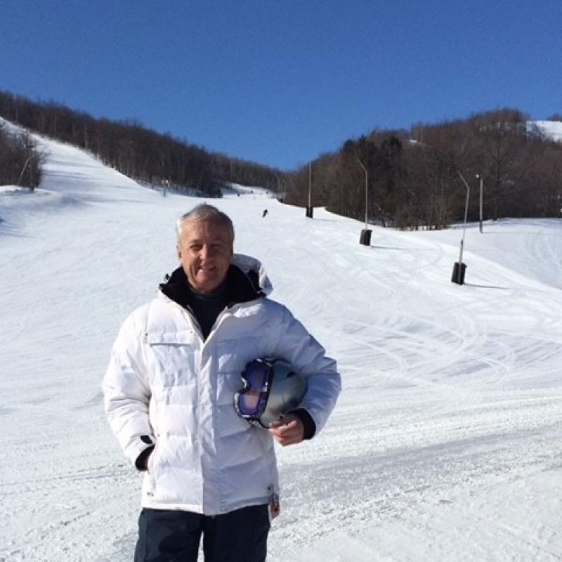 Image of Dennis Donohoe at a ski hill